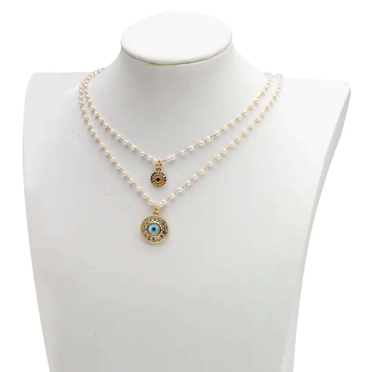Evil Eye Pendants in dainty Faux pearl chain necklace | Erika Williner Designs