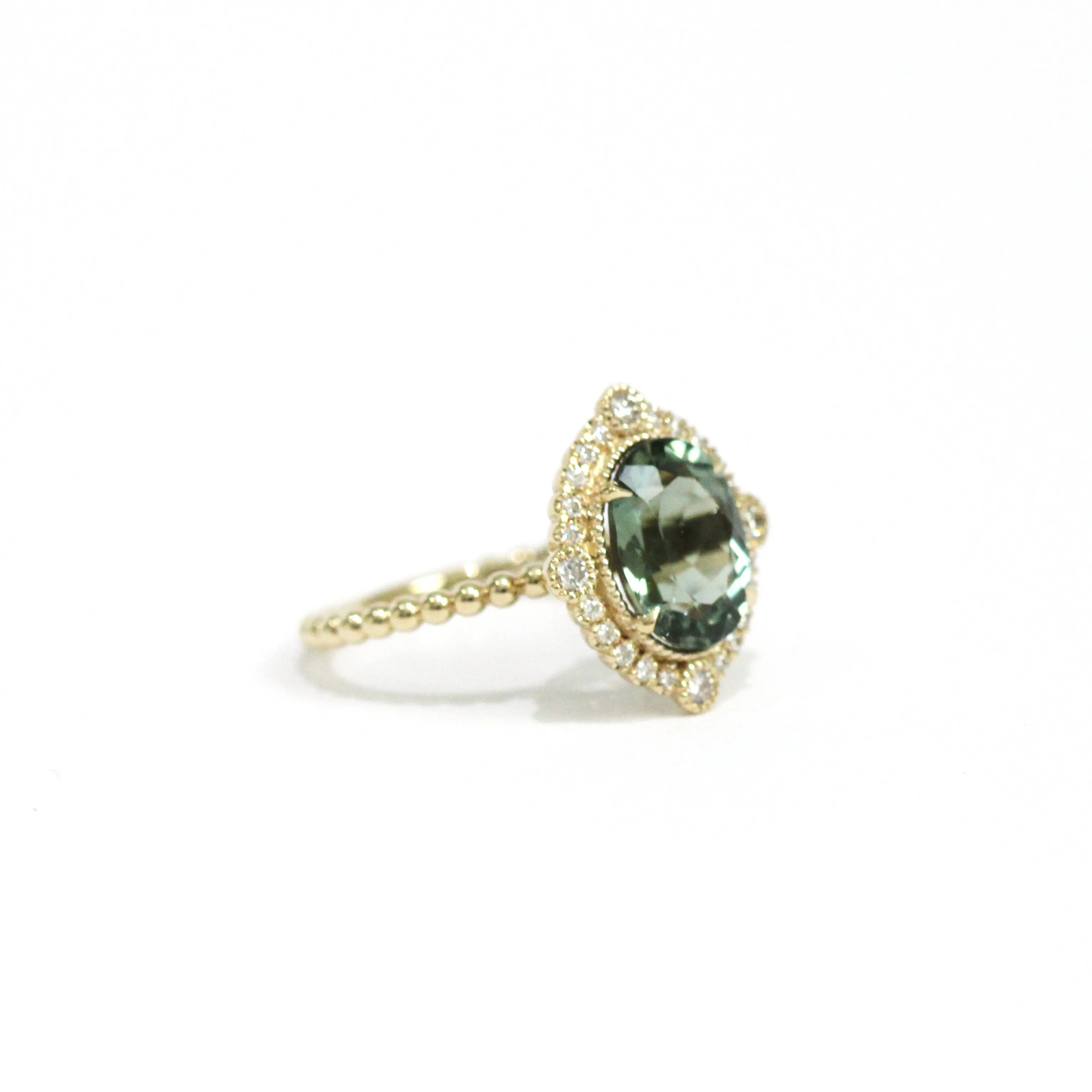 Green Tourmaline Diamond Bezel and Halo Ring