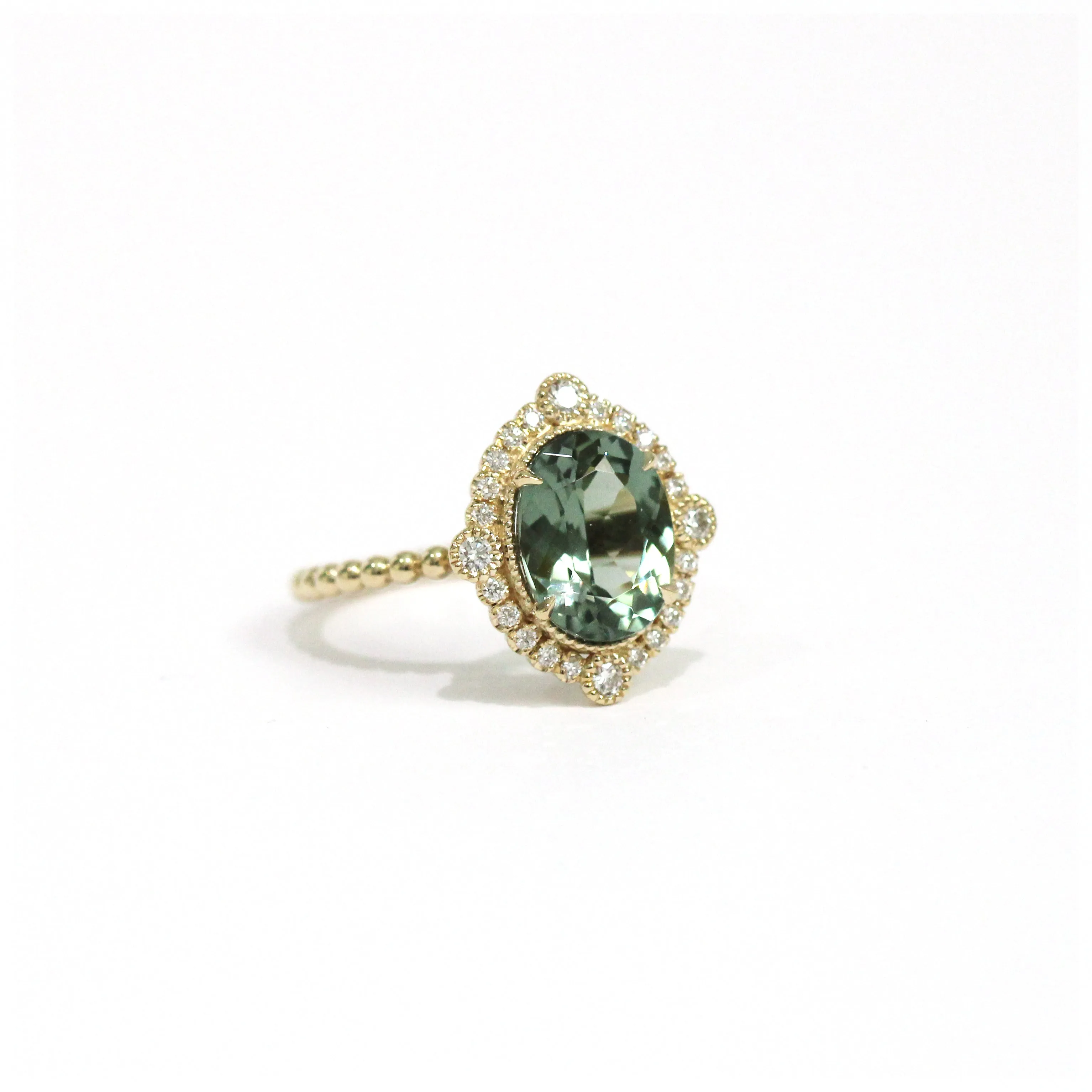 Green Tourmaline Diamond Bezel and Halo Ring