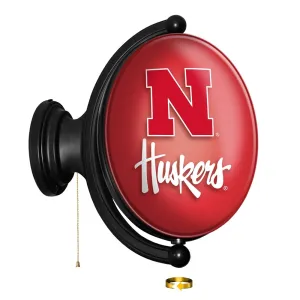 Nebraska Cornhuskers: Original Oval Rotating Lighted Wall Sign