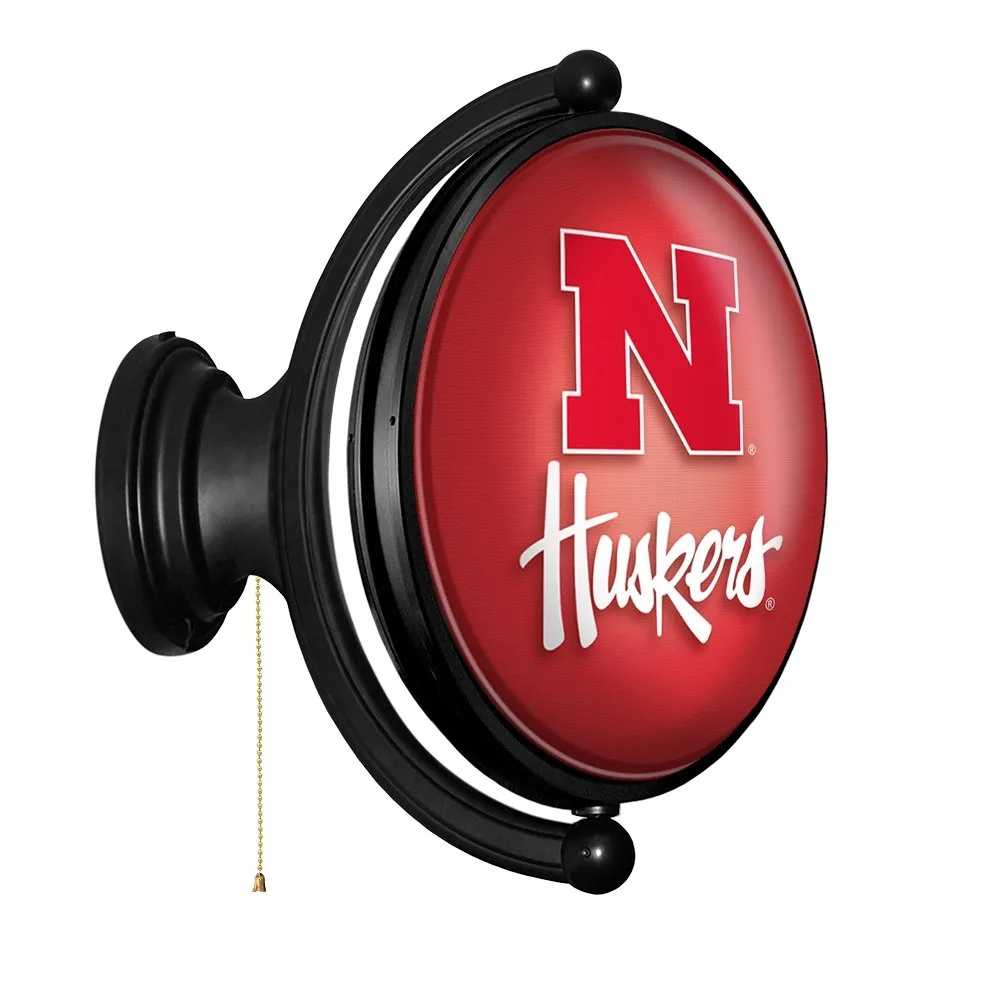 Nebraska Cornhuskers: Original Oval Rotating Lighted Wall Sign