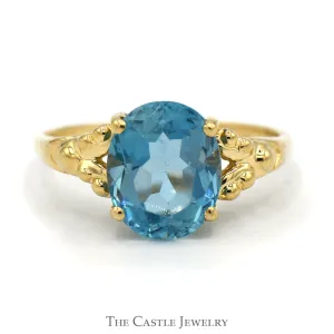 Oval Blue Topaz Ring with Beaded Split Sides in 14k Yellow Gold