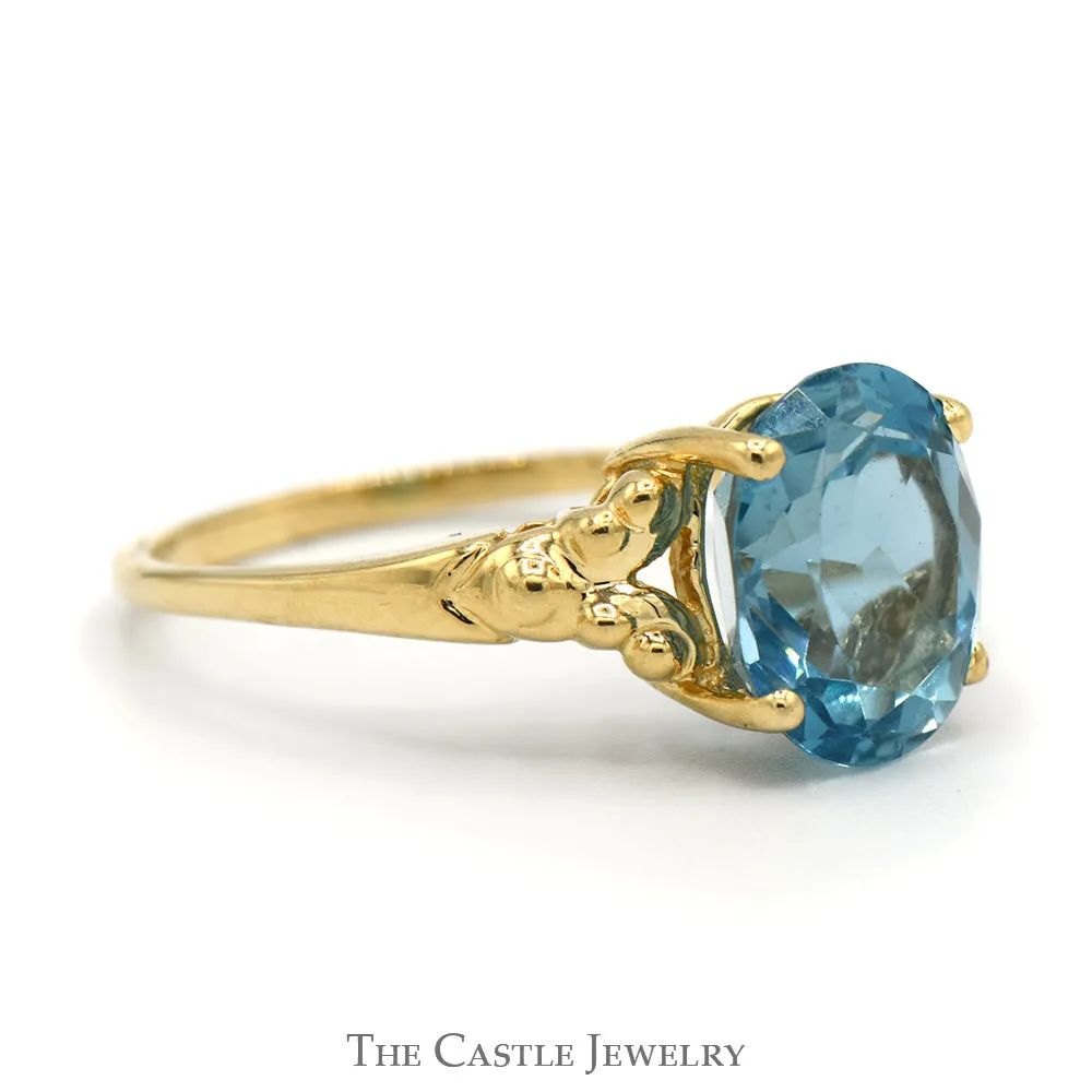 Oval Blue Topaz Ring with Beaded Split Sides in 14k Yellow Gold