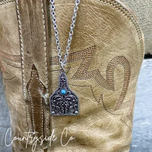 Tooled Silver & Turquoise Accent Cowtag Necklace