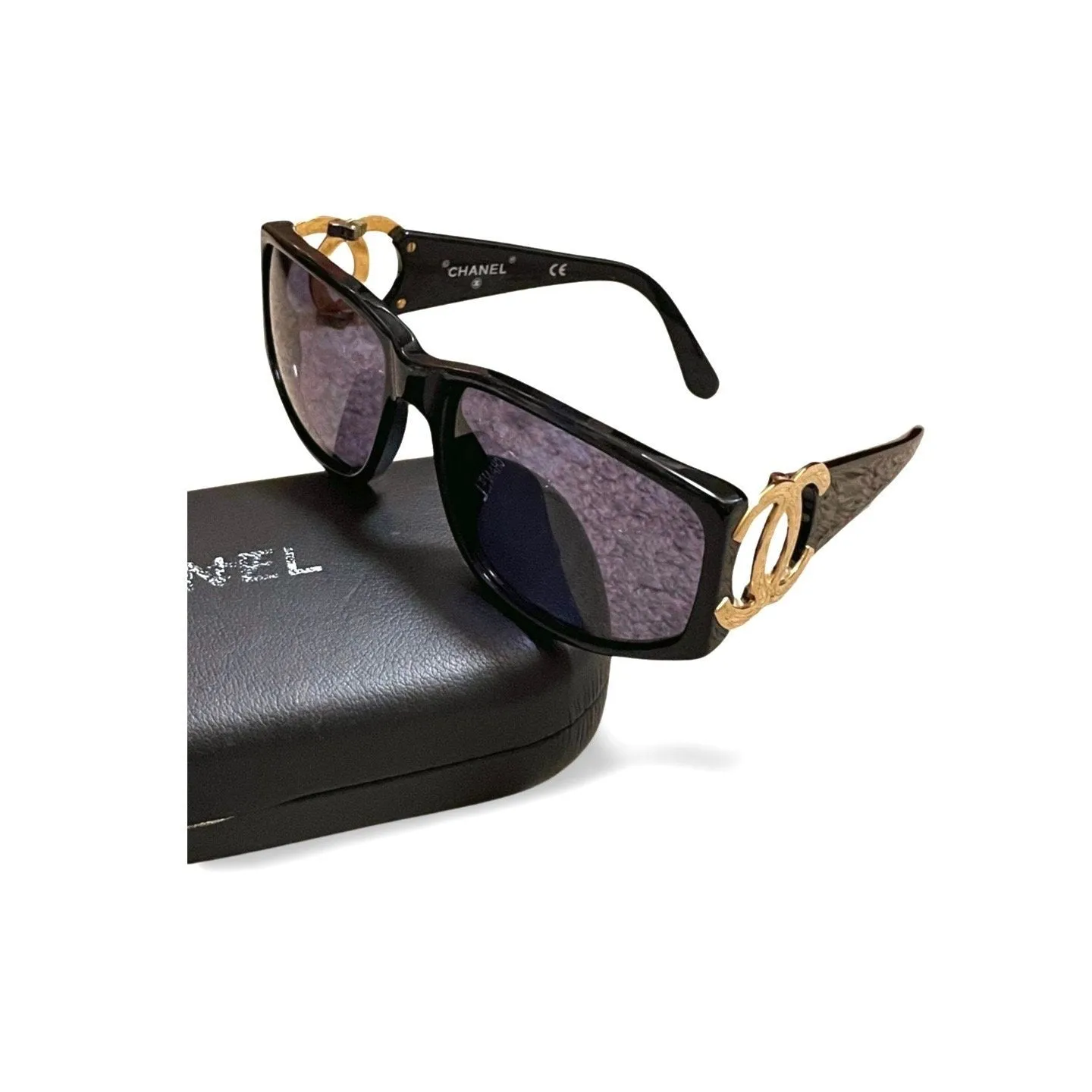 Vintage CHANEL black frame sunglasses with large CC motifs at sides. Mod and chic eyewear you must get. 060521ac4