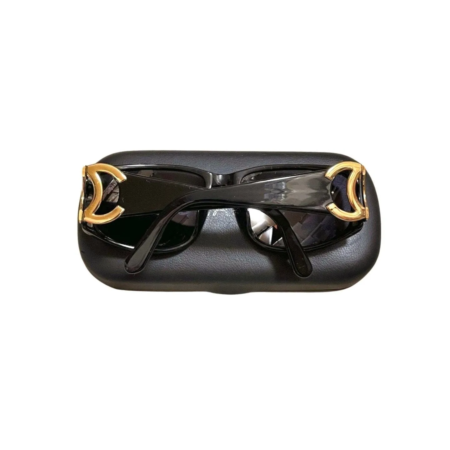 Vintage CHANEL black frame sunglasses with large CC motifs at sides. Mod and chic eyewear you must get. 060521ac4