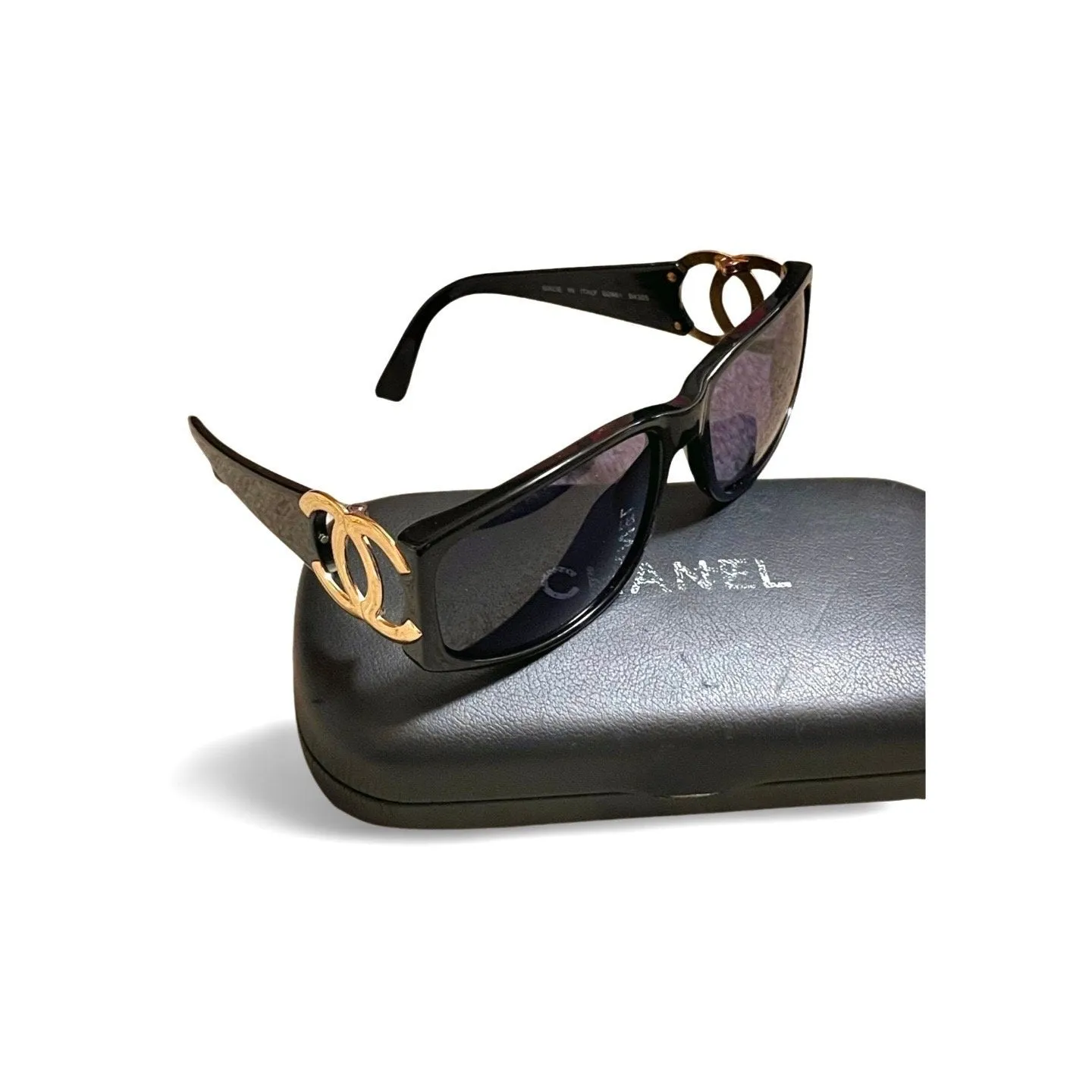 Vintage CHANEL black frame sunglasses with large CC motifs at sides. Mod and chic eyewear you must get. 060521ac4