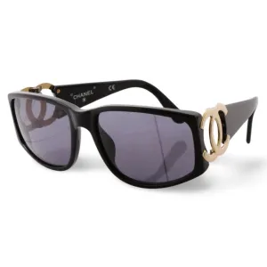 Vintage CHANEL black frame sunglasses with large CC motifs at sides. Mod and chic eyewear you must get. 060521ac4