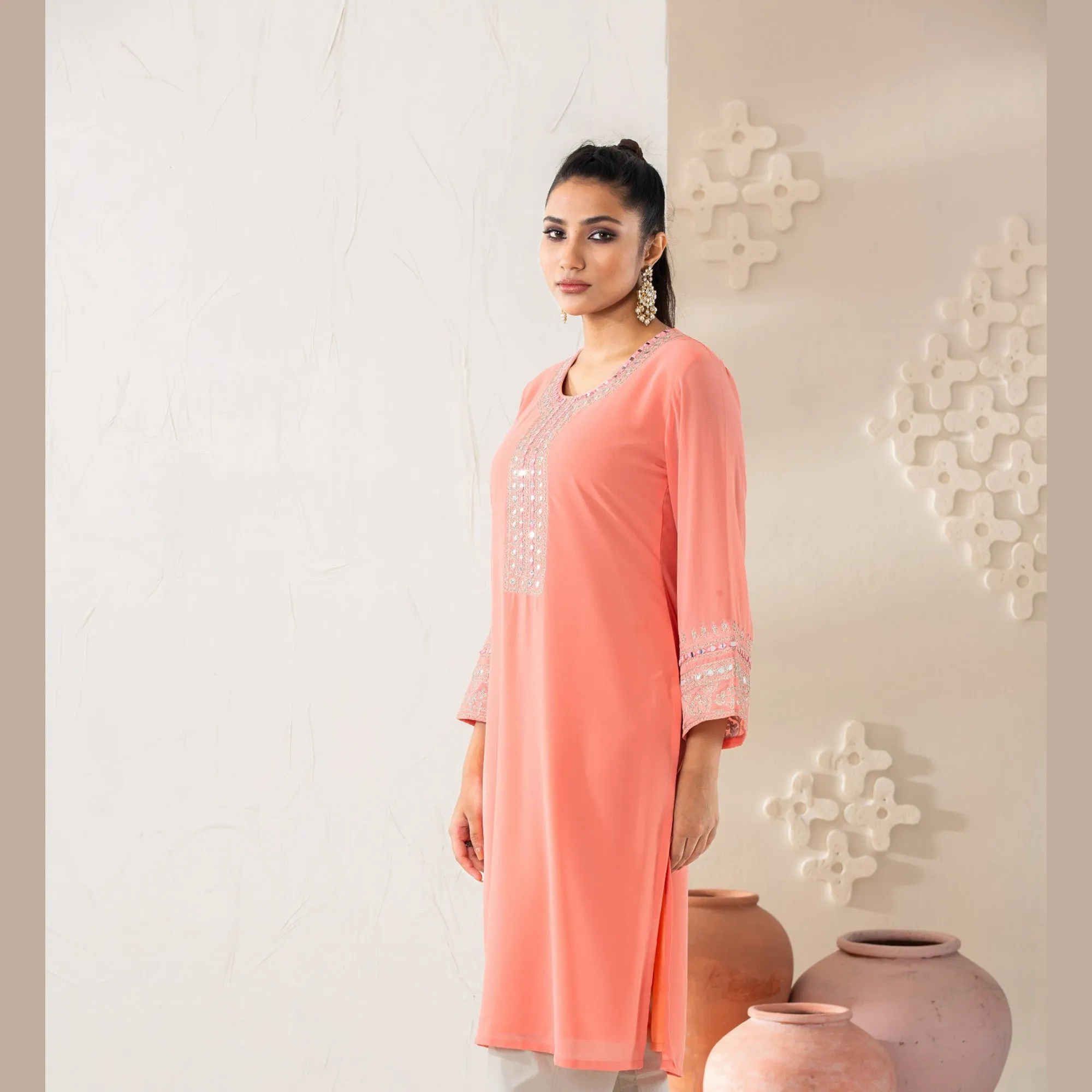 Women Peach Embroidered Kurti